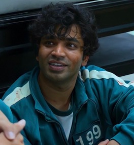 Player 199 Or Ali Abdul in his green Squid Game tracksuit